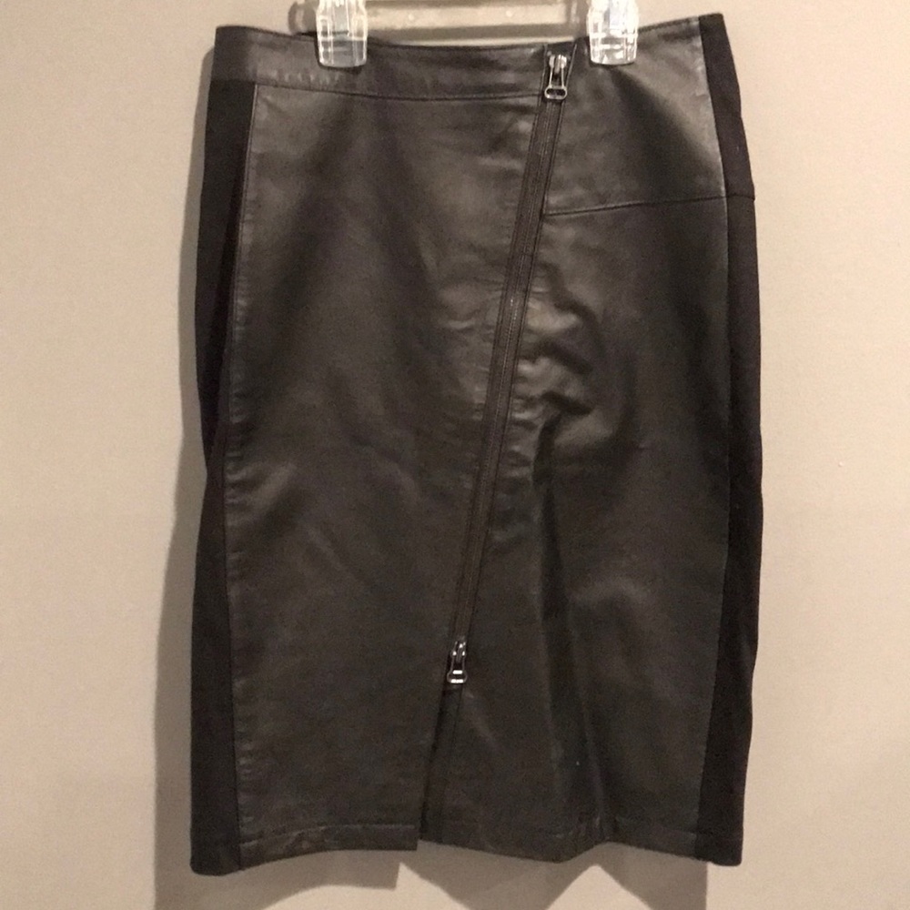 Midi length black skirt